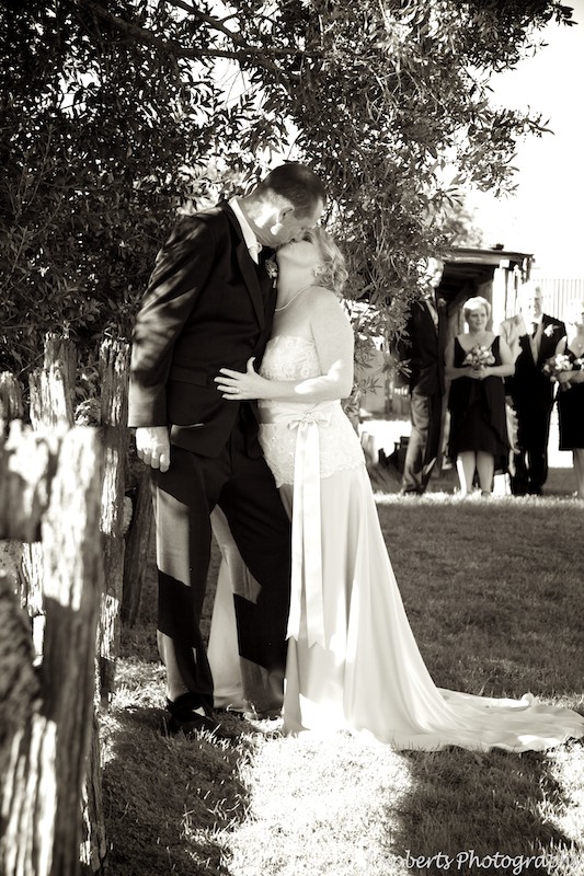 Sepia photo bride and groom kissing - wedding photography sydney